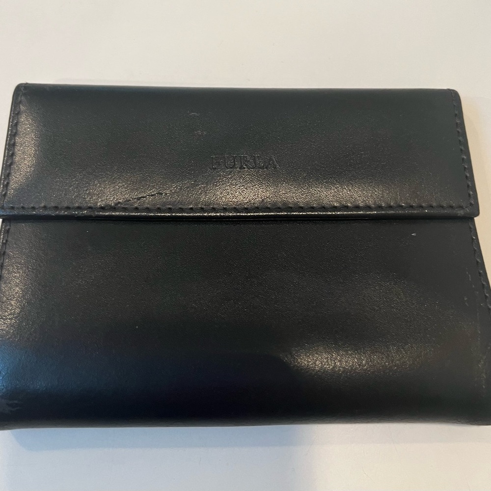 Furla black leather wallet in like new condition